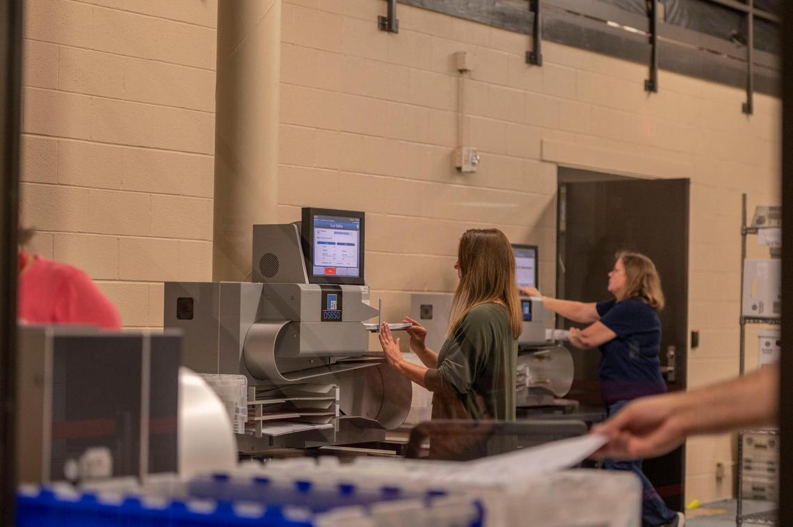 Election workers sort out voter ballots through a machine at the Johnson County Election Office on Tuesday, Aug. 16, 2022, in Olathe. Kansas’ largest counties will undergo a recount of ballots from the August 2, election in an attempt by Value Them Both supporters to overturn the state’s vote in favor of abortion rights.