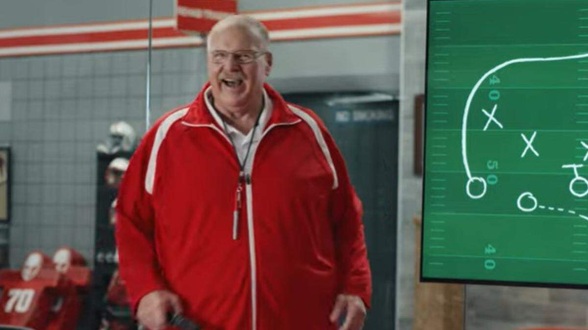 Andy Reid laughed after making a mistake during his State Farm commercial.