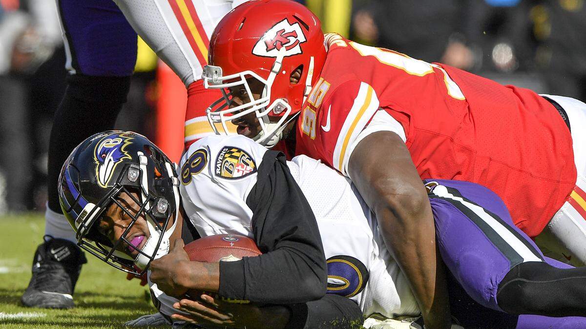 Chiefs defensive end Chris Jones sacks Baltimore Ravens quarterback Lamar Jackson in the first quarter.