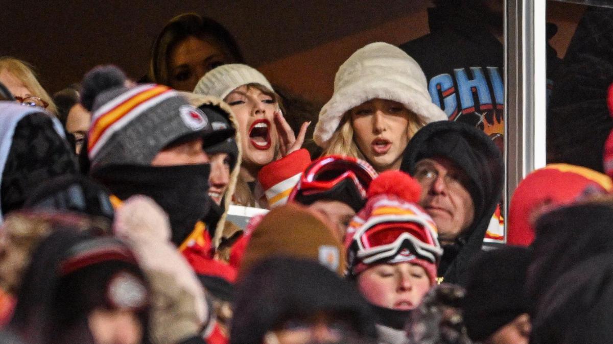 Pop star Taylor Swift yells while she watches the Kansas City Chiefs play the Miami Dolphins with Brittany Mahomes in a suite Saturday, Jan. 13, 2024, at GEHA Field at Arrowhead Stadium.