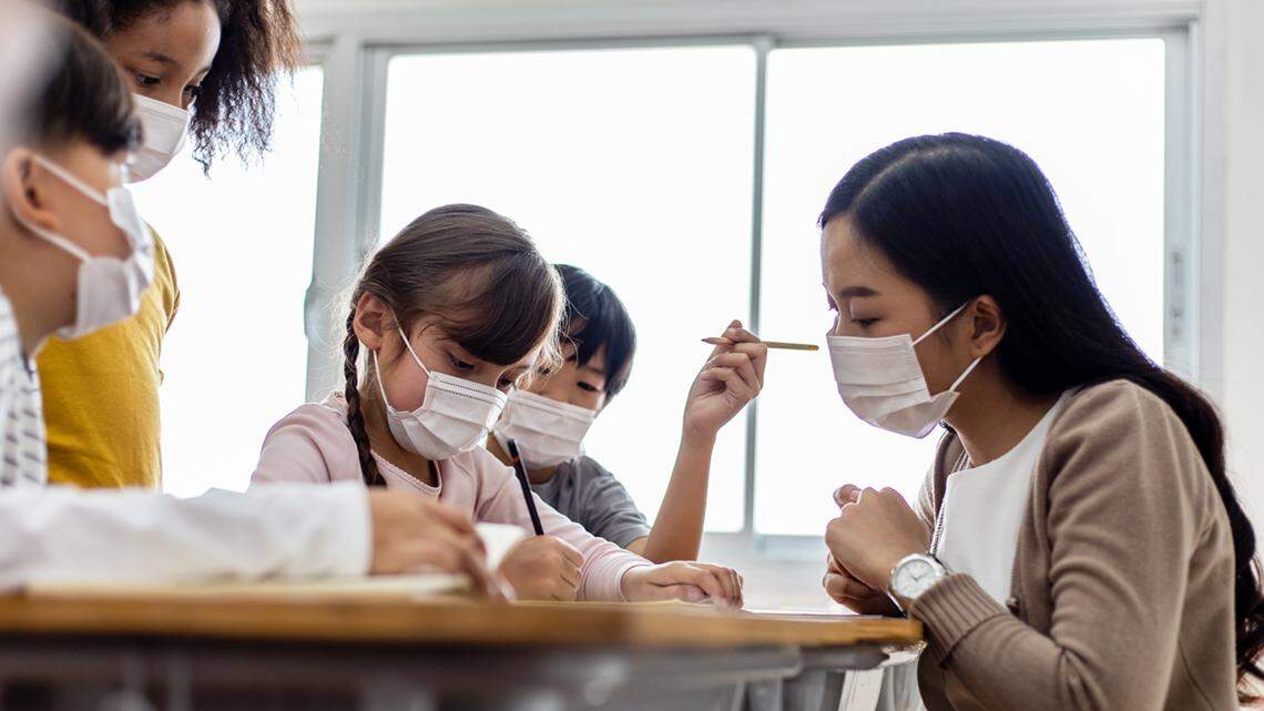 school children students teacher mask covid coronavirus
