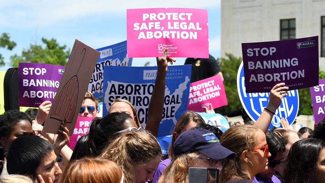 Pro-abortion activists hold placards during a rally at the Supreme Court in reaction to the passage of bills in Alabama, Georgia, Missouri and other states that restrict access to abortion on May 21, 2019 in Washington, DC. Photo by Olivier Douliery/Abaca/Sipa USA