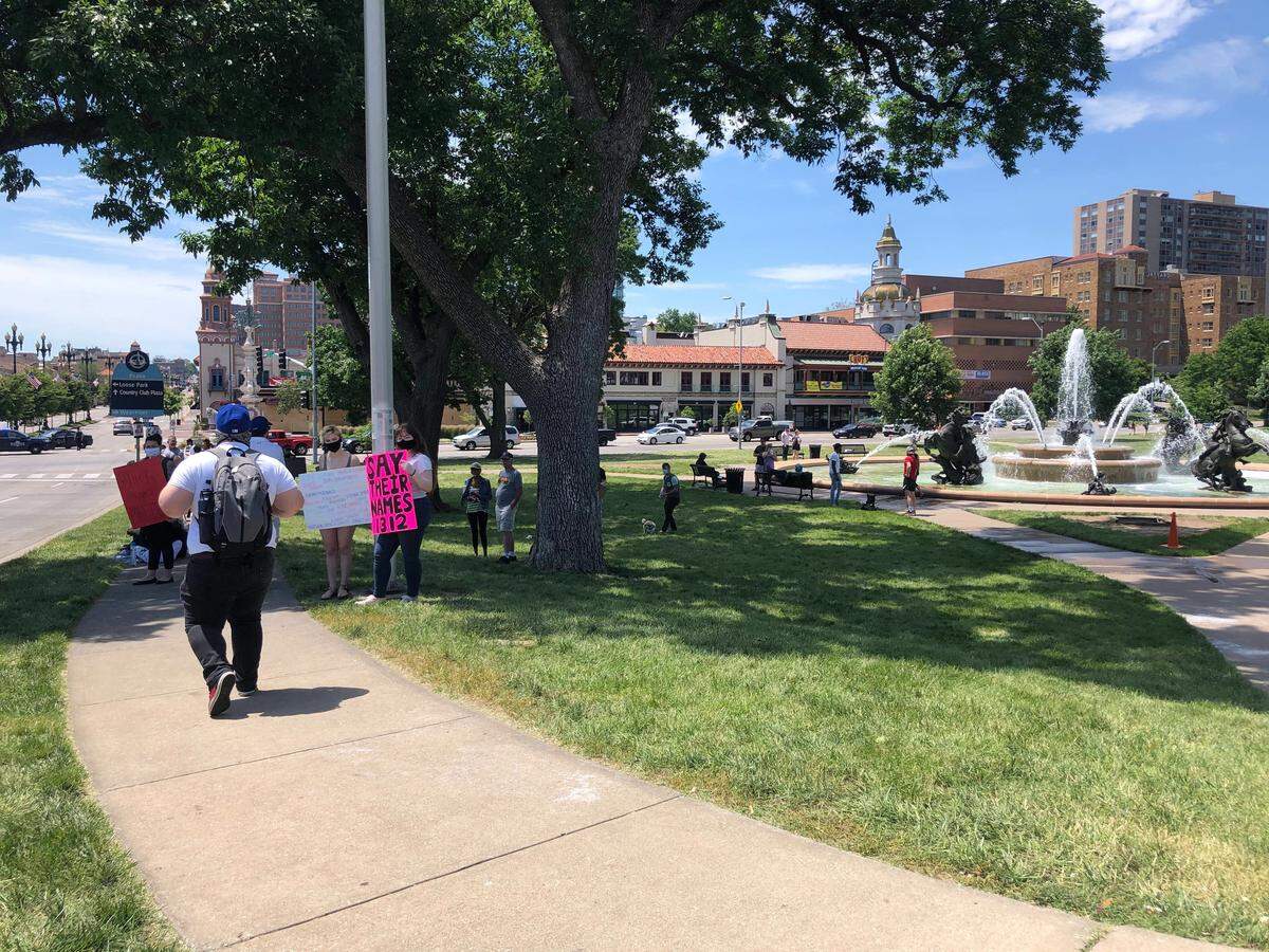 A small group of people began gathering at the J.C. Nichols Memorial Fountain at the Country Club Plaza around 2 p.m. Monday, June 1, 2020, where hundreds over the weekend were protesting police brutality and the death of George Floyd.