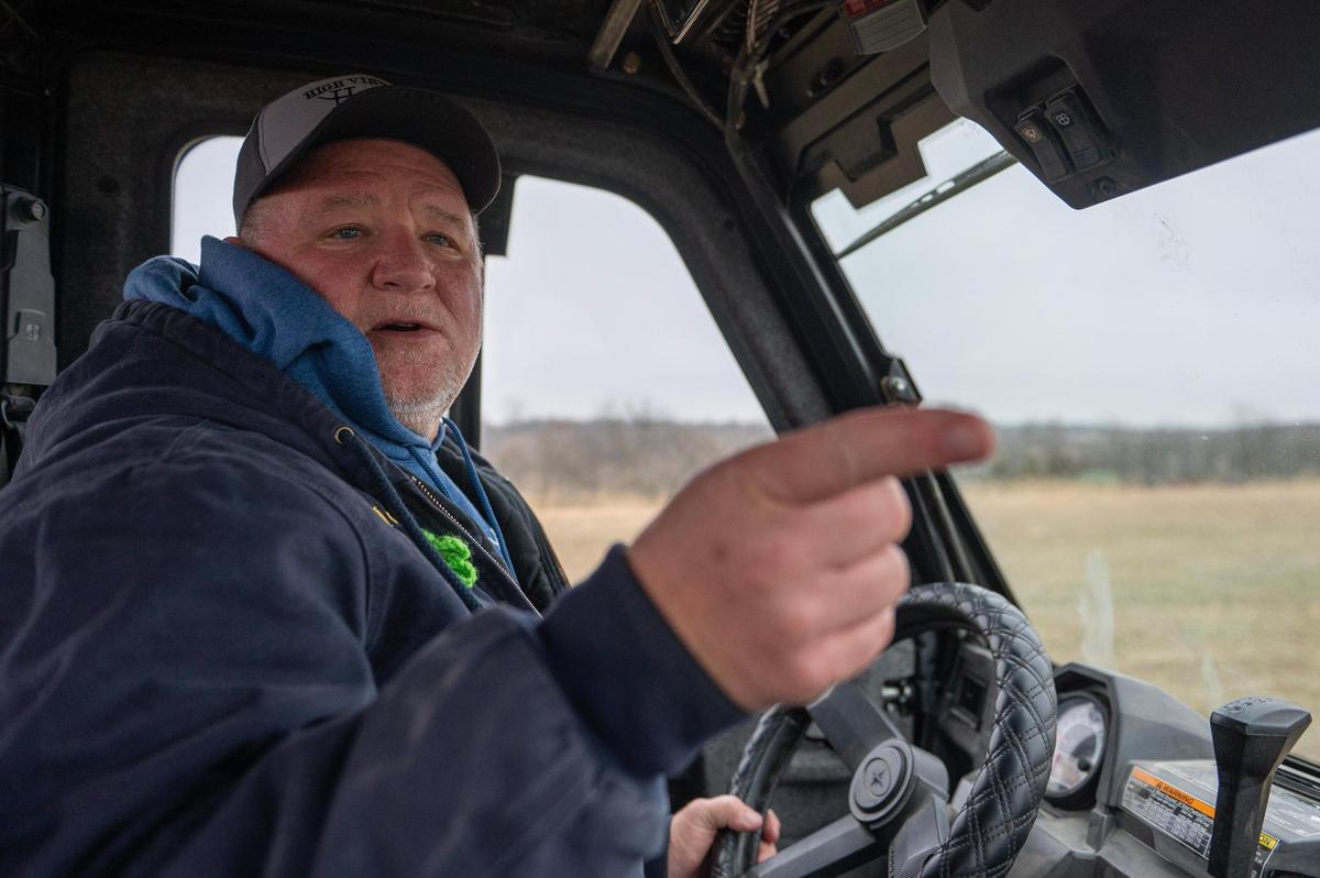 Howard Crook gives a tour of his property on March 7 in Easton. He said the area has been negatively impacted by a nearby landfill that caught on fire last year and has been smoldering in spots since then.