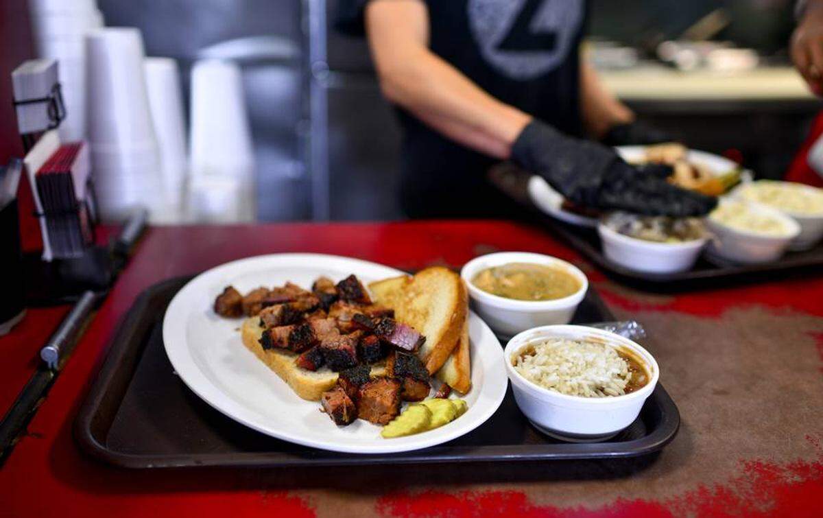 The burnt ends at Joe's KC BBQ are an iconic Kansas City dish. They serve a vegetarian version of the popular Z-Man sandwich.
