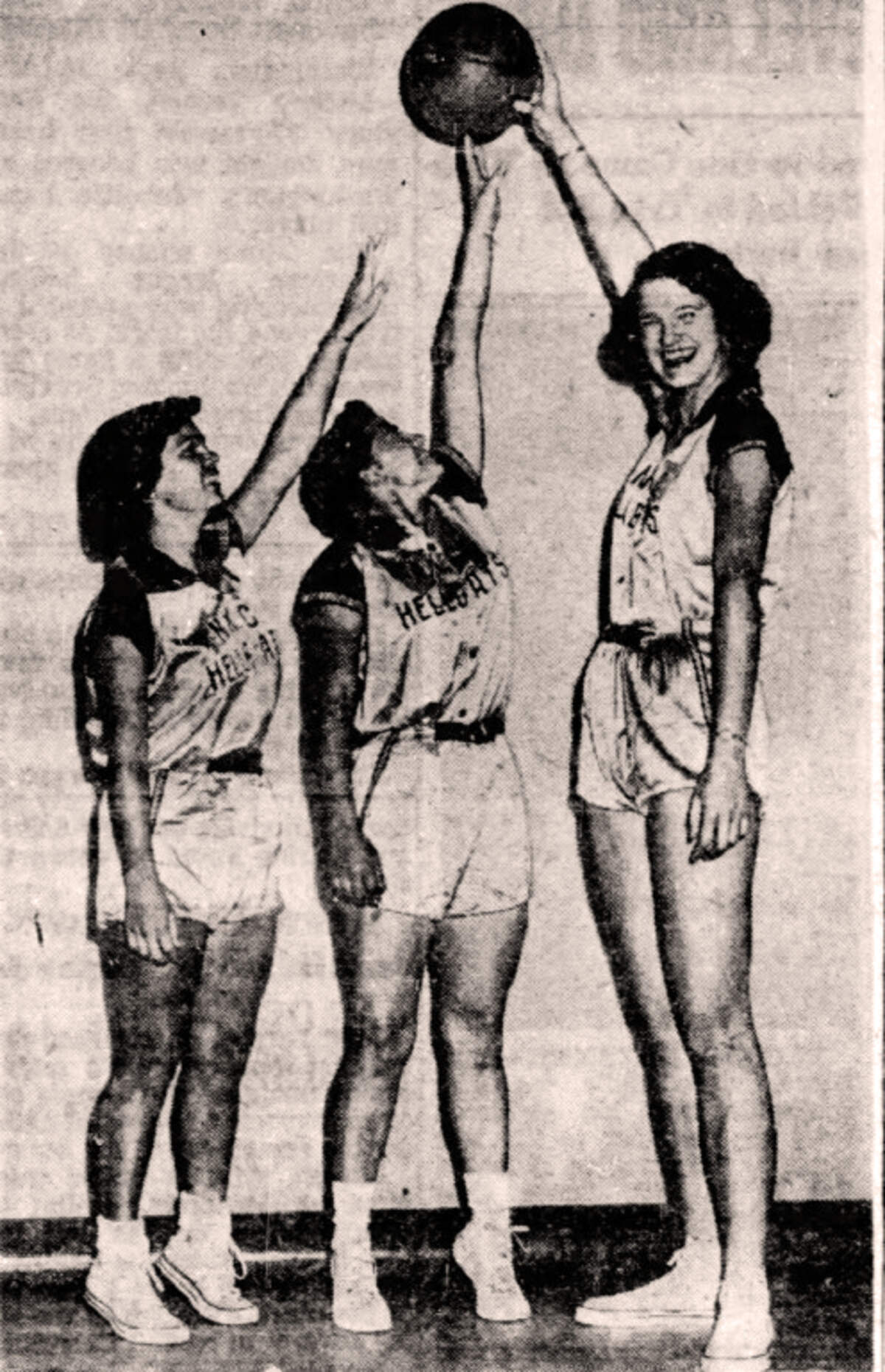 This photo in The Kansas City Times on Sep 15, 1955, showed just how tall the Hellcats’ new player, Jackie Wray, was compared with teammates Virginia Colby, left, and Becky Elliott. Colby, now Virginia Russo, lives in Camarillo, California, and has fond memories of her days with the Hellcats.