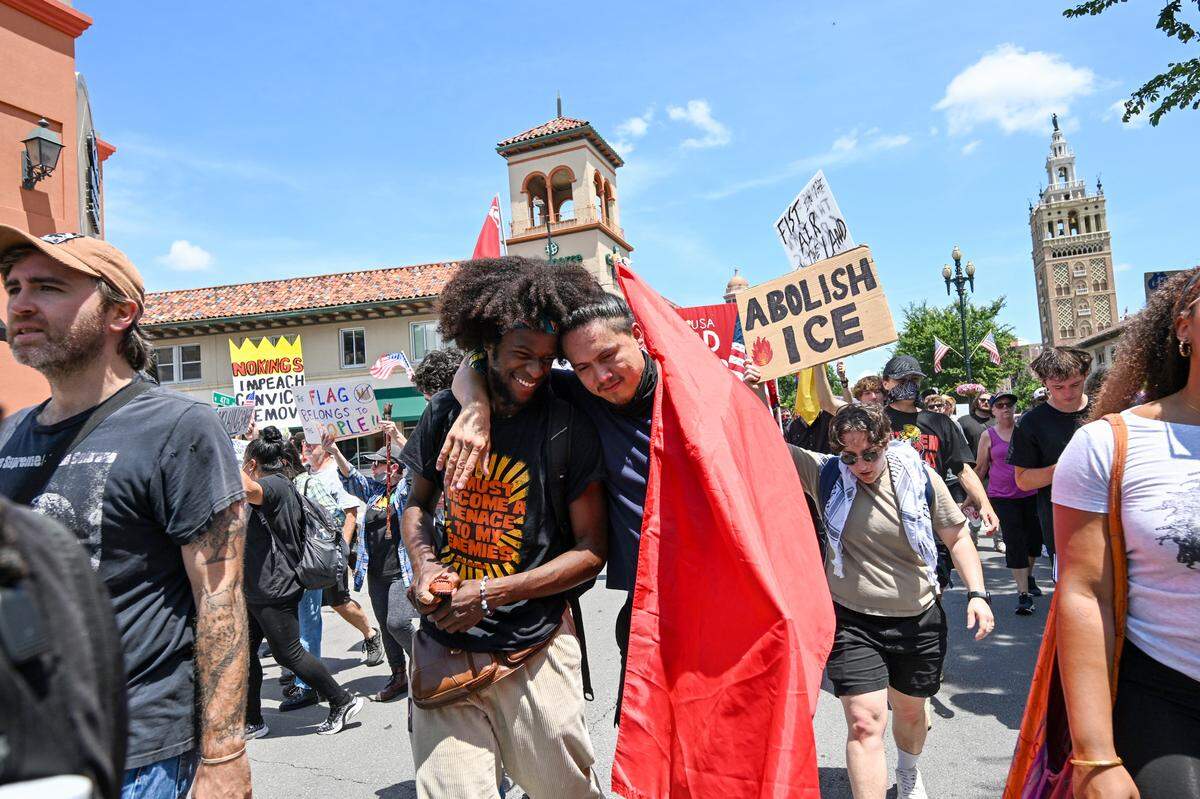 Participants in the “No Kings” day of defiance rally marched toward Westport after rallying earlier at Mill Creek Park on Saturday, June 14, 2025, in Kansas City