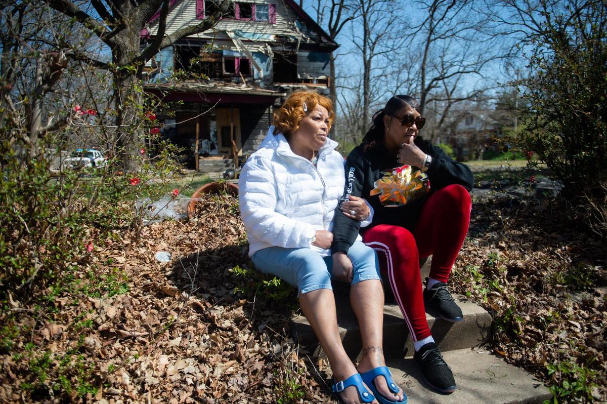 Annie Nelvis, left, and Johnnie Nelvis, both from Atlanta, arrived in Kansas City Friday, April 2, 2021, and stopped by their sister Dora Gamble’s home in the 5400 block of Woodland Avenue, to take a look for themselves at the damage the fire had done. Police on Friday identified the 66-year-old Gamble as the woman who died from injuries sustained in a suspicious house fire Wednesday evening in the 5400 block of Woodland Avenue.