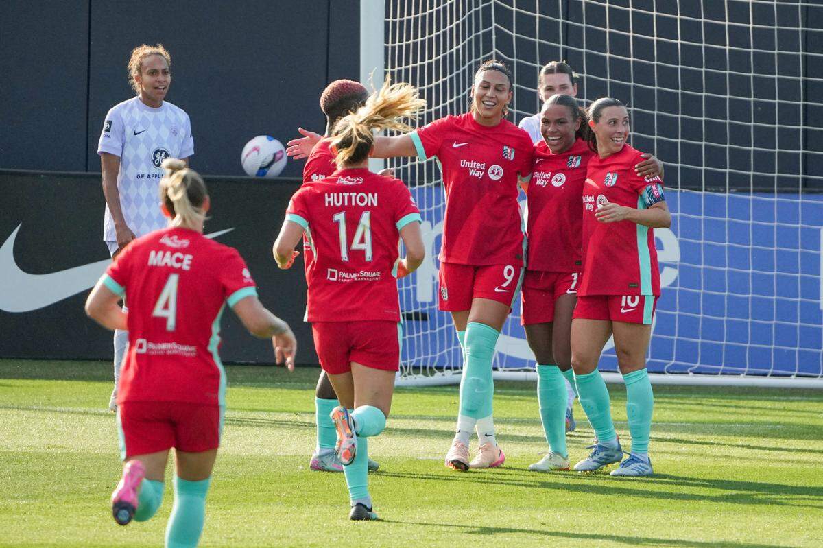 Kansas City Current forward Michelle Cooper (17) celebrates with teammates after scoring against Racing Louisville FC during the first half at CPKC Stadium on June 14, 2025.