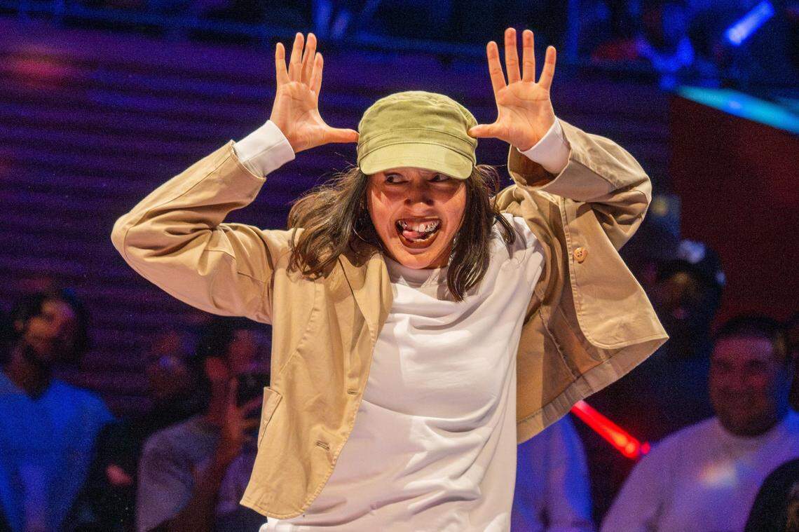 “Passion” flashes a toothy grin in a dance battle against E Solo during the Red Bull Dance Your Style Midwest Regional Qualifier, on Saturday, April 25, 2026, at the Kauffman Center for the Performing Arts. Dancers are judged on musicality, technical skills, and creativity.