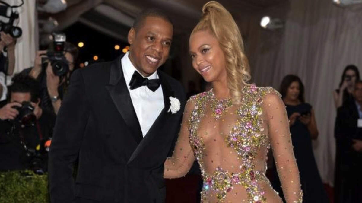 In this May 2015 photo, Jay Z and Beyonce arrive at The Metropolitan Museum of Art's Costume Institute benefit gala in New York. The pair have announced they will hit the road together this summer and fall for a stadium tour. The hip-hop super couple will kick off their "On the Run II" tour June 6 in Cardiff, Wales. The tour will hit 15 cities across the United Kingdom and Europe and 21 cities in North America, including Boston, Detroit, New Orleans, Houston, Los Angeles, Atlanta and Miami.