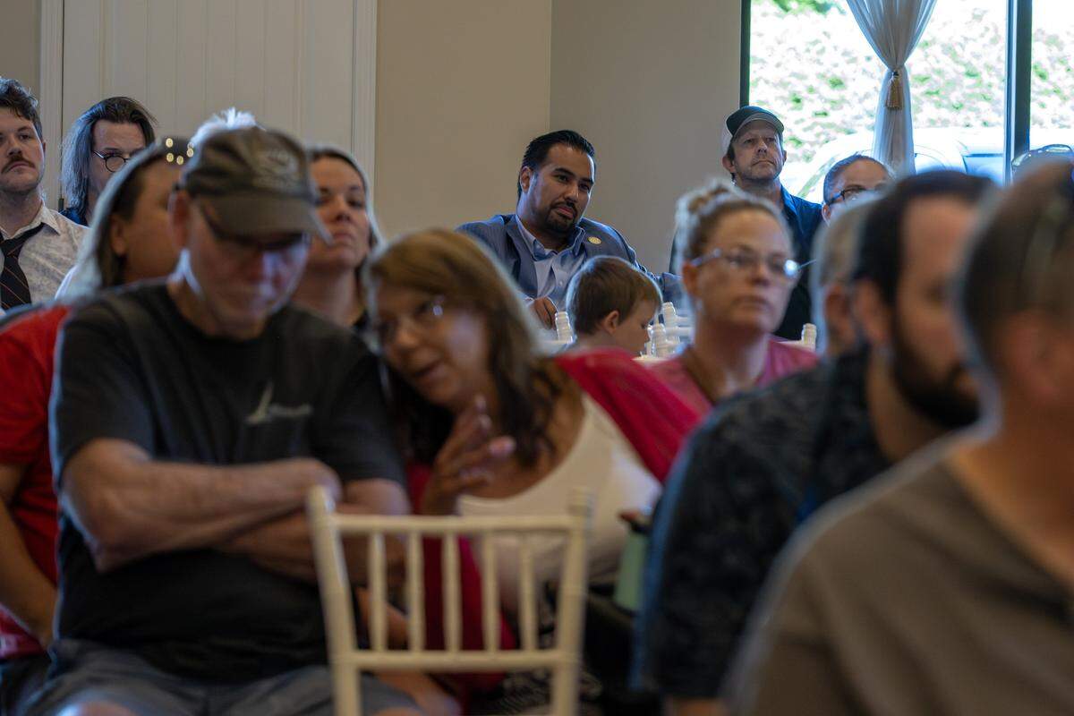 Manuel Abarca IV, First District Legislator in Jackson County, sits in the back of the room during a town hall meeting on Tuesday, June 2, 2026, in Independence, Mo. The meeting focused on opposition to the proposed Nebius data center project.