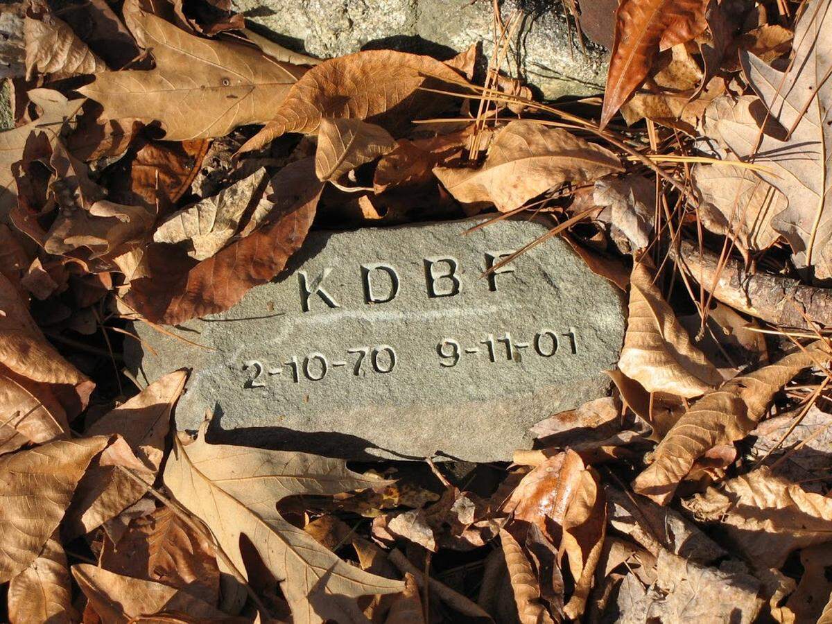 Karleton Fyfe’s recovered remains — one 7-inch thigh bone — are buried under this stone in Chapel Hill, North Carolina.