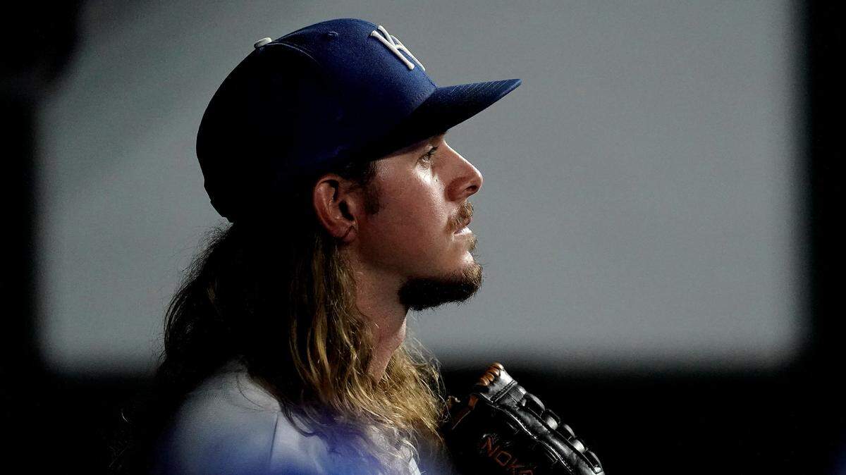 Kansas City Royals relief pitcher Scott Barlow watches from the bullpen during the eighth inning of a baseball game against the Minnesota Twins Tuesday, Sept. 20, 2022, in Kansas City, Mo. The Royals won 5-4. (AP Photo/Charlie Riedel)