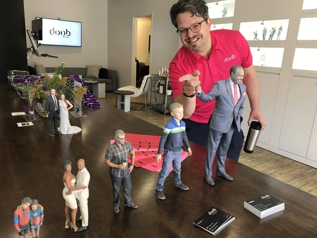 Fabian Conde, director of business development for Doob3D, with some 3D replicas. The pop-up business is going to stay longer on the Plaza.