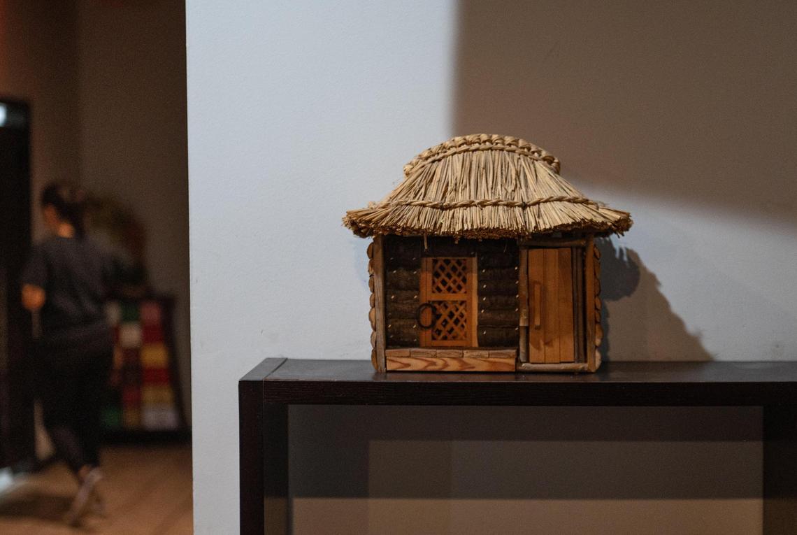 A miniature house sits on a shelf at Choga. In Korean, “choga” translates to a traditional house made with natural materials such as wood, straw and mud.