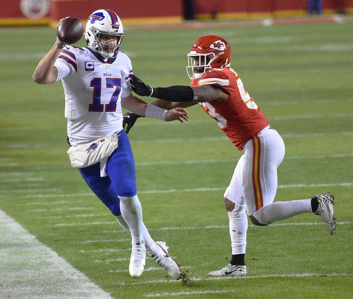 Kansas City Chiefs middle linebacker Anthony Hitchens pushes Buffalo Bills quarterback Josh Allen out of bounds before he can complete a pass late in the second quarter Sunday, January 24, 2021, during the AFC Championship Game at Arrowhead Stadium in Kansas City, Missouri.
