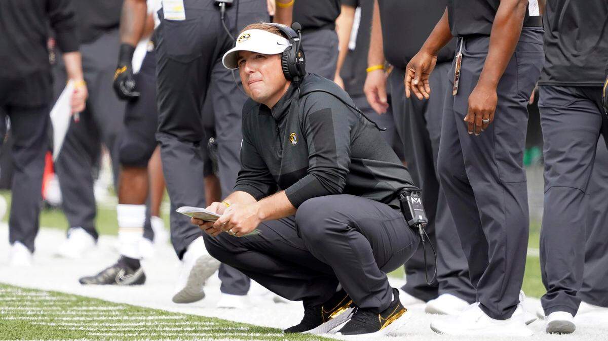 Missouri head coach Eliah Drinkwitz looks on from the sideline during the first half of an NCAA college football game against Boston College, Saturday, Sept. 25, 2021, in Boston. (AP Photo/Mary Schwalm)