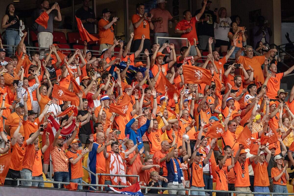 Netherlands fans celebrate after the team's 3-1 victory over Tunisia in a FIFA World Cup group-stage soccer match at Kansas City Stadium on Thursday, June 25, 2026.