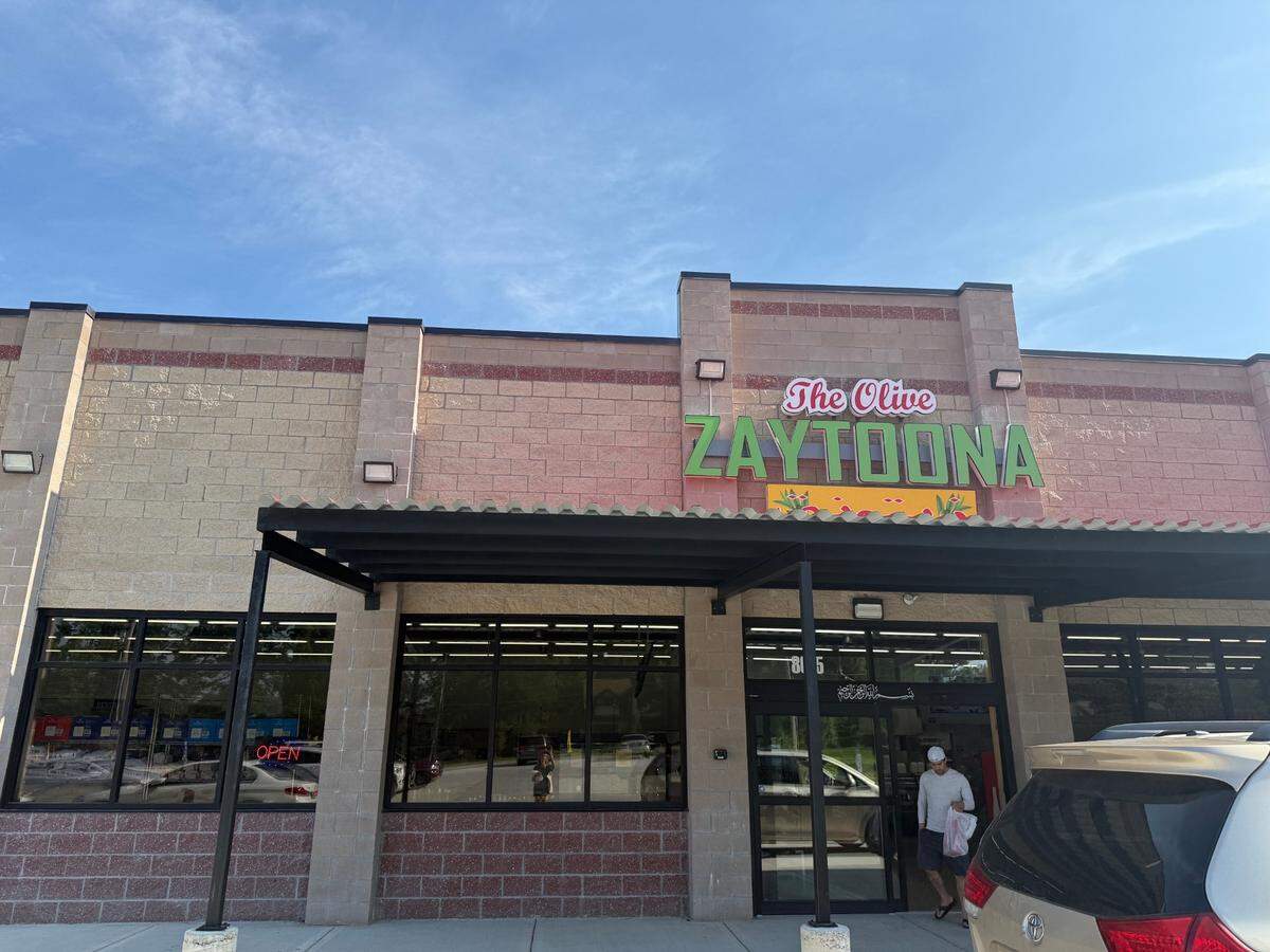 The owners of Olive Cafe have opened a three-in-one business nearby.