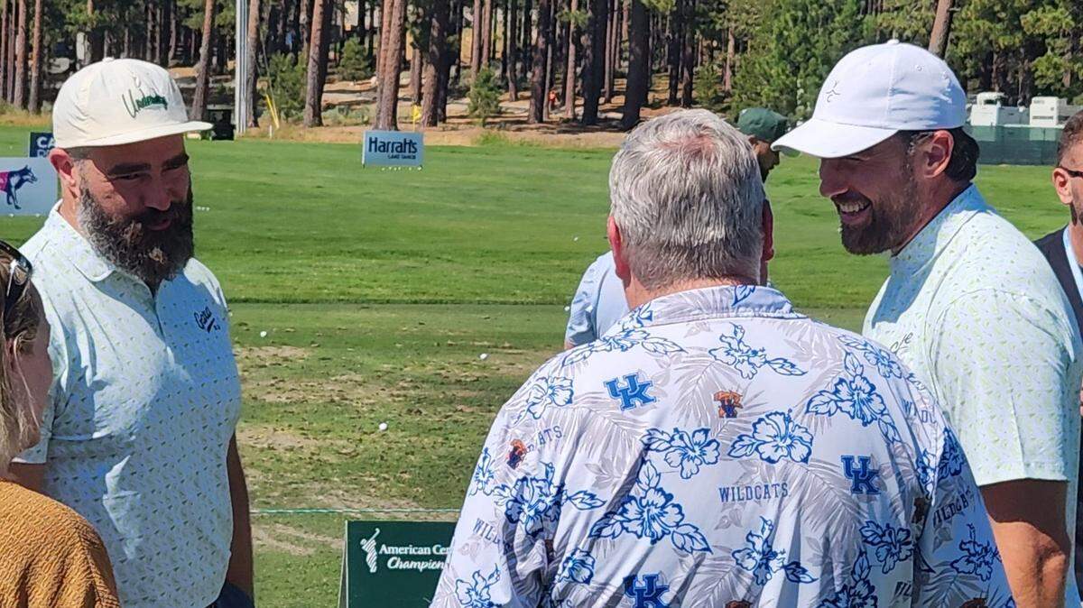 Jason Kelce, left, and Travis Kelce, far right, talk to fans Thursday, July 10, 2025 at Edgewood Tahoe golf course ahead of the American Century Championship celebrity golf tournament.