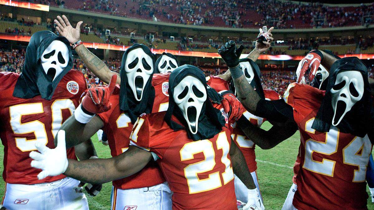 Kansas City Chiefs celebrate with Halloween masks after their 23-20 overtime win over the San Diego Chargers during Monday’s football game on October 31, 2011, in Kansas City, MO. John Sleezer/The Kansas City Star