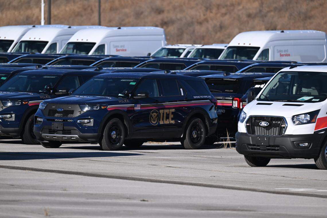 ICE vehicles parked in a lot near Worlds of Fun in Kansas City on Wednesday, Jan. 14, 2026.