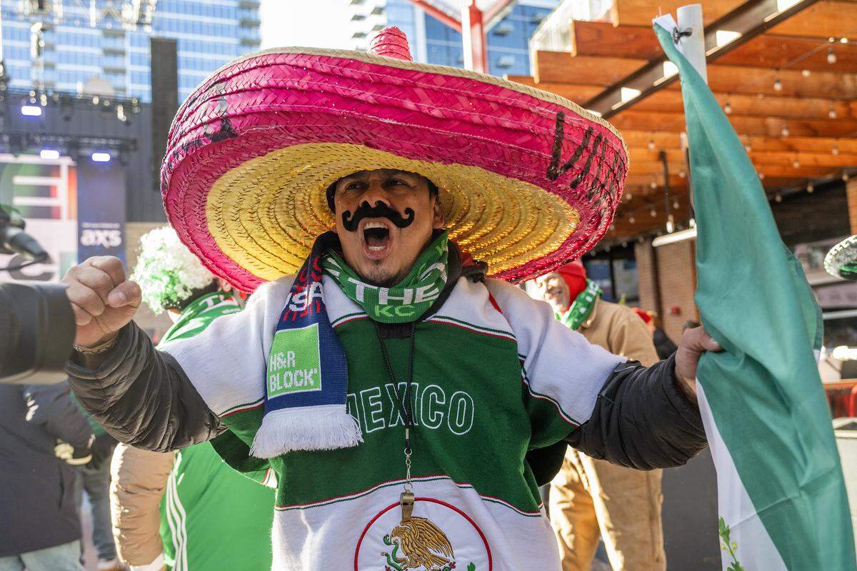 Ramon Rodriguez, a Mexico fan, cheers during the FIFA World Cup draw watch party at the Power & Light District on Friday, Dec. 5, 2025, in Kansas City.