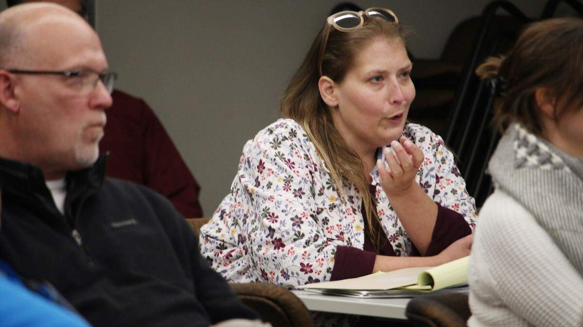 Tara Coleman shares a few thoughts during the fall graduation ceremony for the Johnson County Citizens Academy.