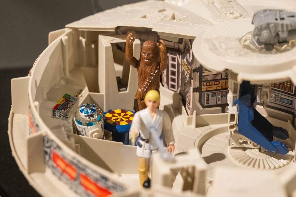 A recreated scene from Star Wars of Chewbacca and R2D2 playing a game inside the Millennium Falcon, using Kenner Toys is on display at the National Museum of Toys and Miniatures in Kansas City.
