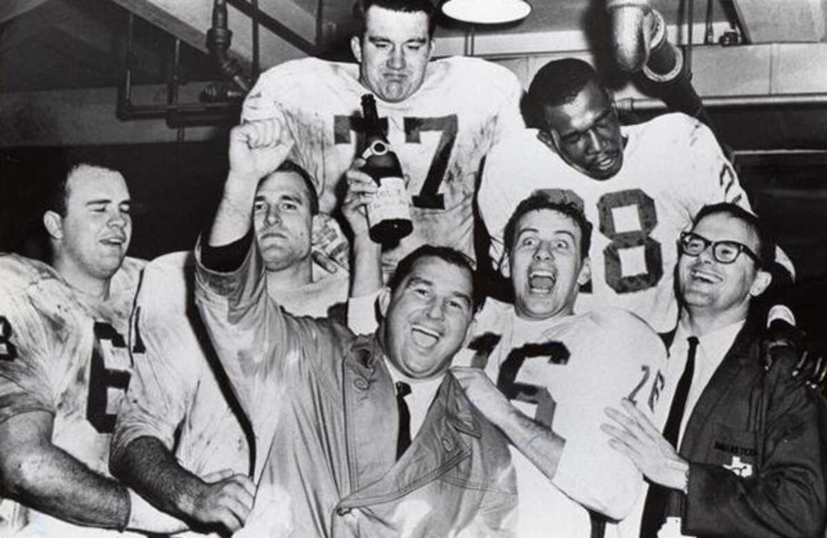 The Dallas Texans celebrated after they won the AFL title in 1962, and Kansas City celebrated after Lamar Hunt (right) moved the franchise here. Front, left to right: Marvin Terrell, Tommy Brooker, Hank Stram, Len Dawson and Lamar Hunt. Back, left to right: Jim Tyrer, Abner Haynes, before they became the Kansas City Chiefs.