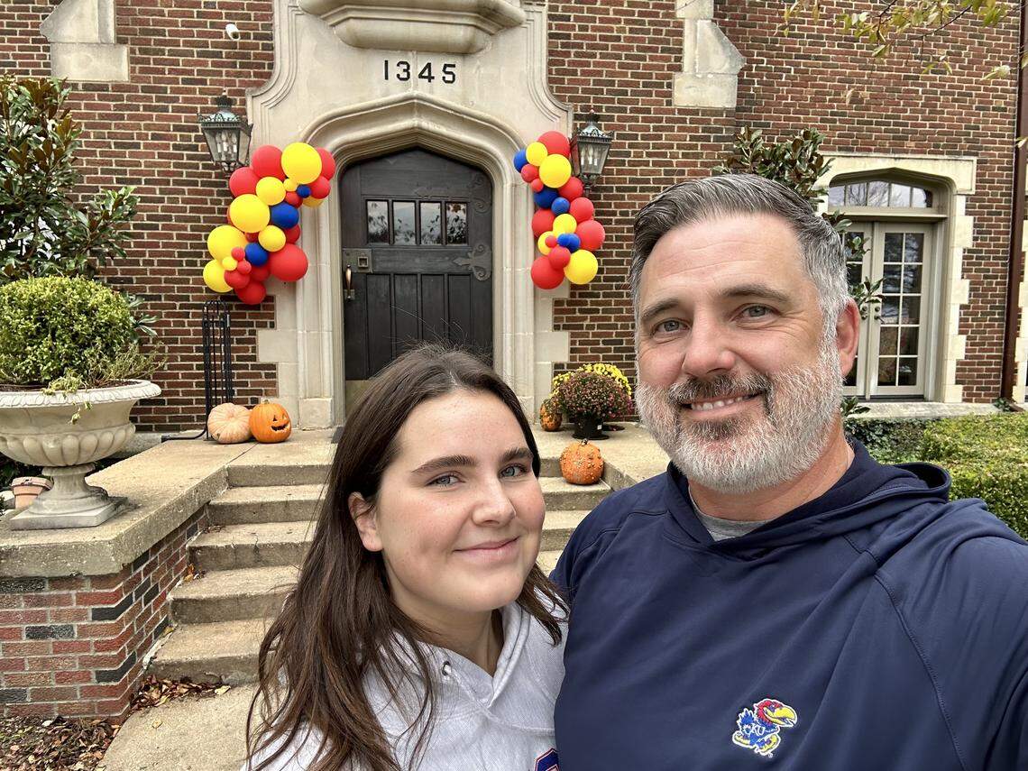 Elsa McGrain (left) with her dad Jordan McGrain (right).