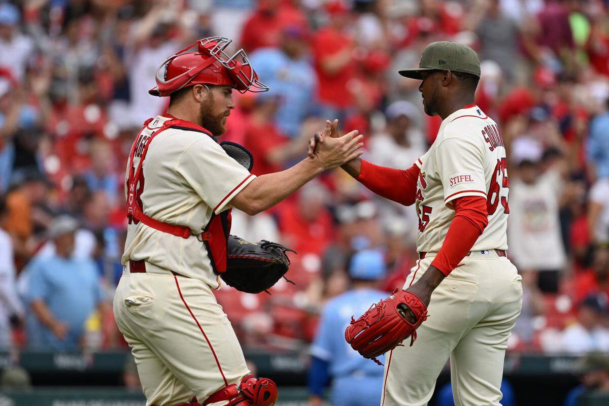 Catcher Pedro Pagés, left, and relief pitcher George Soriano celebrate the Cardinals’ 4-2 win against the Royals at Busch Stadium in St. Louis on Saturday, May 16, 2026.
