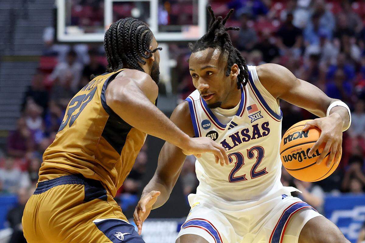 Darryn Peterson #22 of the Kansas Jayhawks drives to the basket against Martel Williams #33 of the California Baptist Lancers during the second half of the game in the first round of the 2026 NCAA Men's Basketball Tournament at Viejas Arena on March 20, 2026 in San Diego.