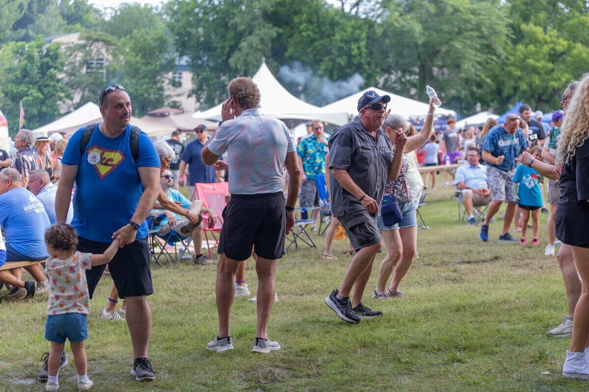 A crowd dances to the live music at The Great Lenexa BBQ Battle on Friday, June 26, 2026.