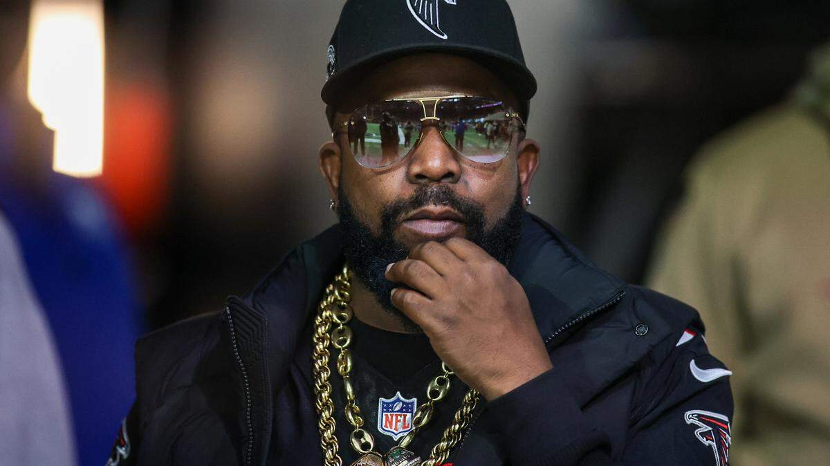 Rapper and entertainer Big Boi prepares to perform during a game between the Atlanta Falcons and New Orleans Saints in the second quarter at Mercedes-Benz Stadium.