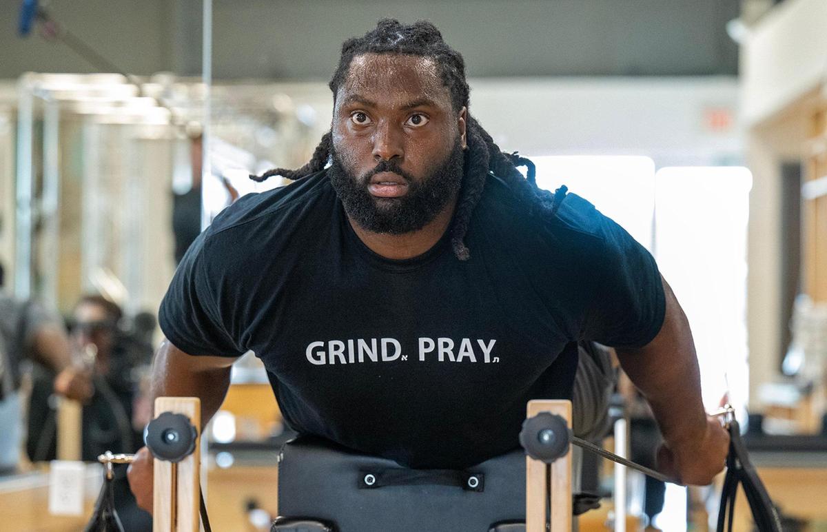 Chiefs defensive tackle Derrick Nnadi workouts on a reformer bed at Pilates By Kahley on Tuesday, Oct. 29, 2024, in Overland Park.