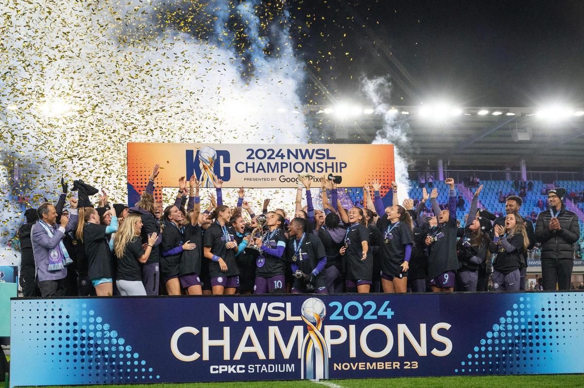 The Orlando Pride hoists the NWSL Championship trophy after defeating the Washington Spirit 1-0 in the final on Saturday, Nov. 23, 2024, at CPKC Stadium.