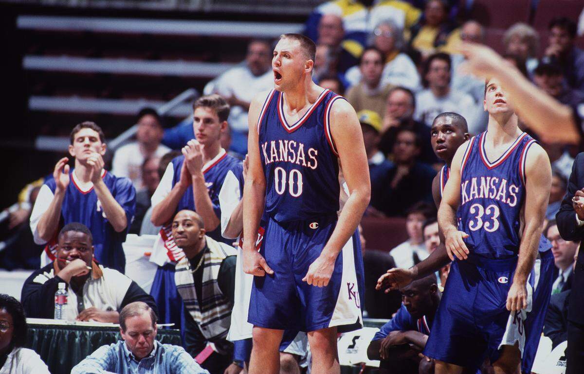University of Kansas center Greg Ostertag yells to teammates during the Jayhawks’ 81-75 win over UMass at the John Wooden Classic on Dec. 3, 1994.