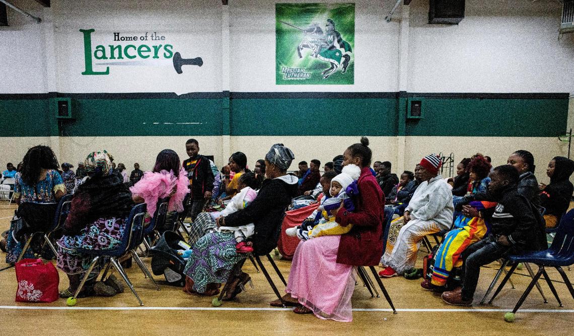 Refugees from the Democratic Republic of the Congo who have settled in Kansas City gather for church services in a gymnasium at Messiah Lutheran Church in Independence. The Salvation Choir performs there weekly.