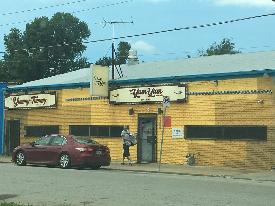 Two security guards with an Overland Park firm were charged with murder in a fatal shooting in June outside the Yum Yum Bar in Kansas City.