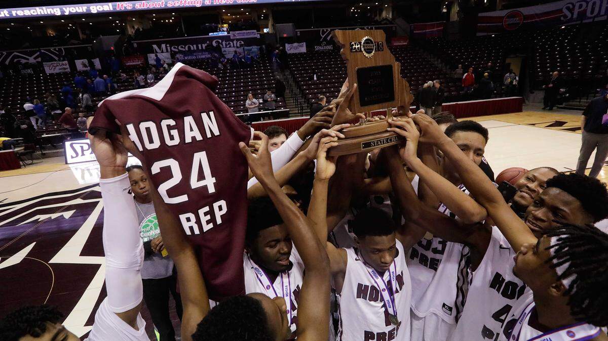 Hogan Prep defeated Charleston in the Class 3 finals, then celebrated the way they have all of their victories since teammate Roosevelt Cooper was killed last year, hoisting his jersey into the air.