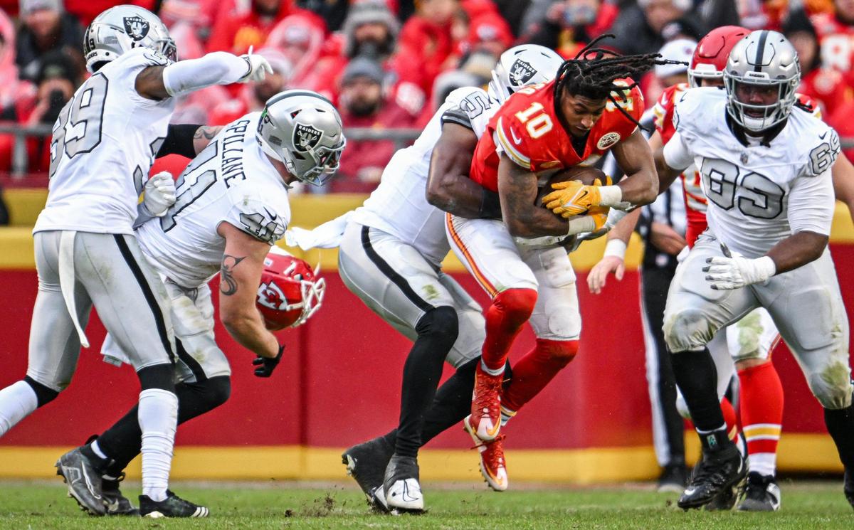Kansas City Chiefs running back Isiah Pacheco (10) left the game after getting a concussion when his helmet flew off and he hit his head while being tackled by the Raiders defense in the second half Monday, Dec. 25, 2023, at GEHA Field at Arrowhead Stadium.