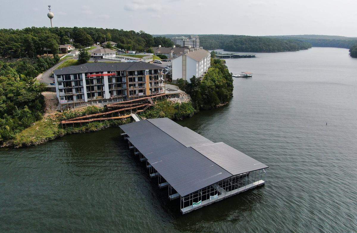 The real estate business is booming in the Lake of the Ozarks region, but affordable housing for many workers is still scarce. Waterside One condominiums are being built in Osage Beach.