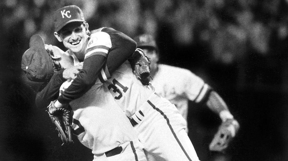 The Kansas City Royals defeated the St. Louis Cardinals to win the 1985 World Series. Having conquered the baseball world, Royals slugger George Brett and pitcher Bret Saberhagen hugged after the final out of the Series.