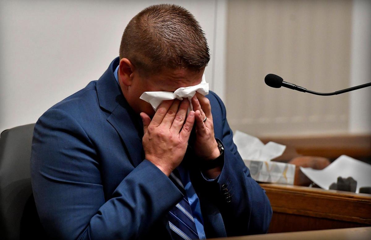 Eric DeValkenaere, a Kansas City, Missouri police detective, who is accused of killing Cameron Lamb, gave emotional testimony Wednesday about what led up to the shooting of Lamb, who was backing his pickup truck into his garage. The trial began Monday morning in Jackson County Circuit Court. DeValkenaere is charged with first-degree involuntary manslaughter and armed criminal action in the death of Lamb on Dec. 3, 2019.