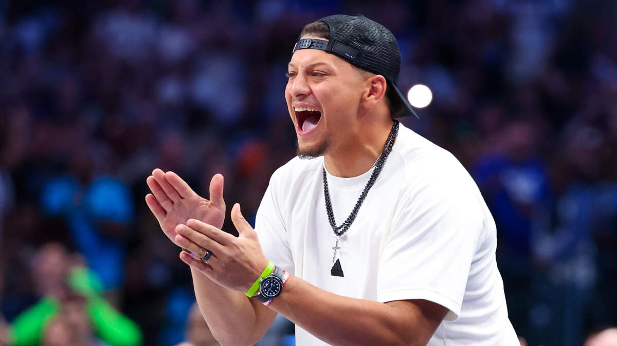 Kansas City Chiefs quarterback Patrick Mahomes II cheers during the game between the Dallas Mavericks and Oklahoma City Thunder during Game 3 of the second round of the 2024 NBA playoffs at American Airlines Center.