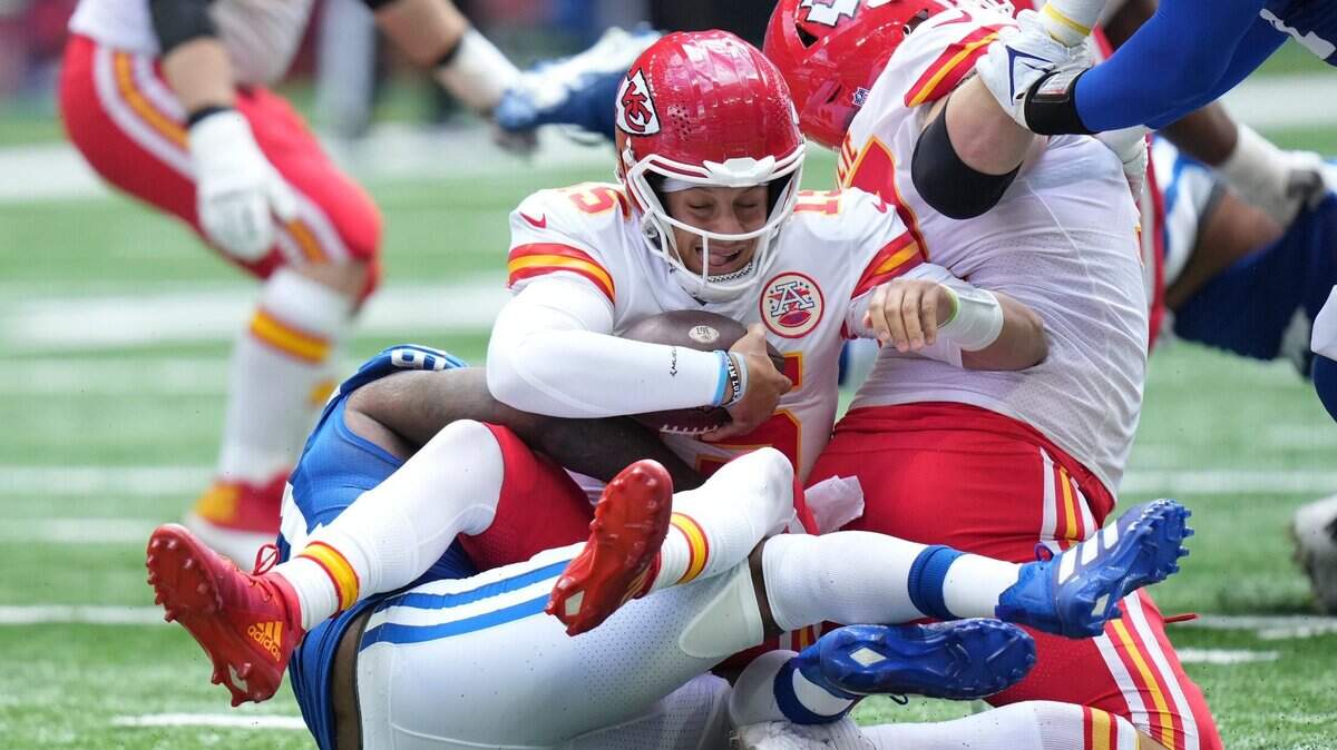 Kansas City Chiefs quarterback Patrick Mahomes is sacked by Colts defensive end Yannick Ngakoue during the first half Sunday in Indianapolis.