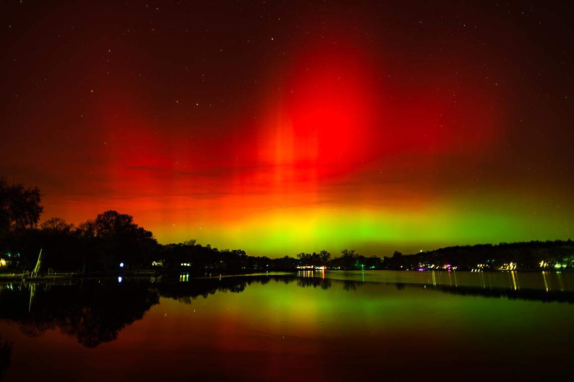 A photo of the northern lights above Lake Elbo in Manhattan, two hours west of Kansas City.