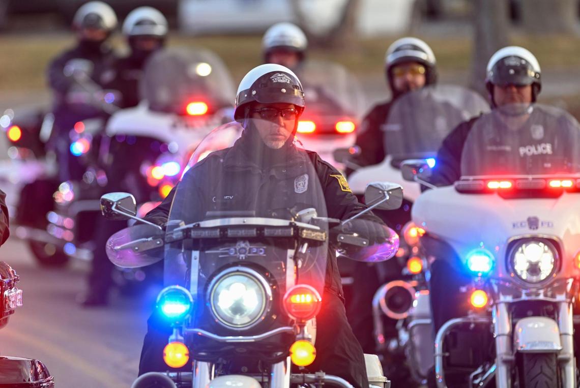 Police line up for a procession to escort the body of fallen Independence police officer Cody Allen from Centerpoint Medical Center to the medical examiner’s office on Thursday, Feb. 29, 2024, in Independence. Allen was shot and killed in the line of duty hours earlier who in the northeast part of the city.